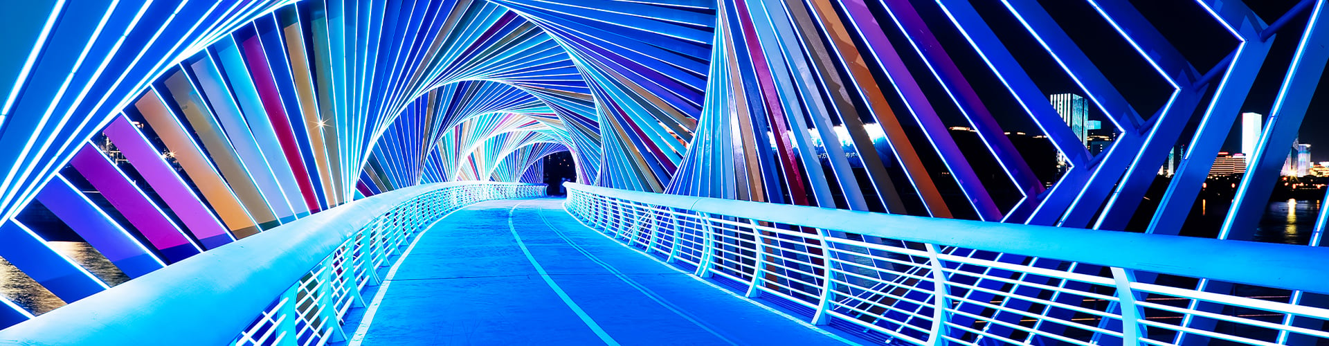 Bridge lit in neon blue